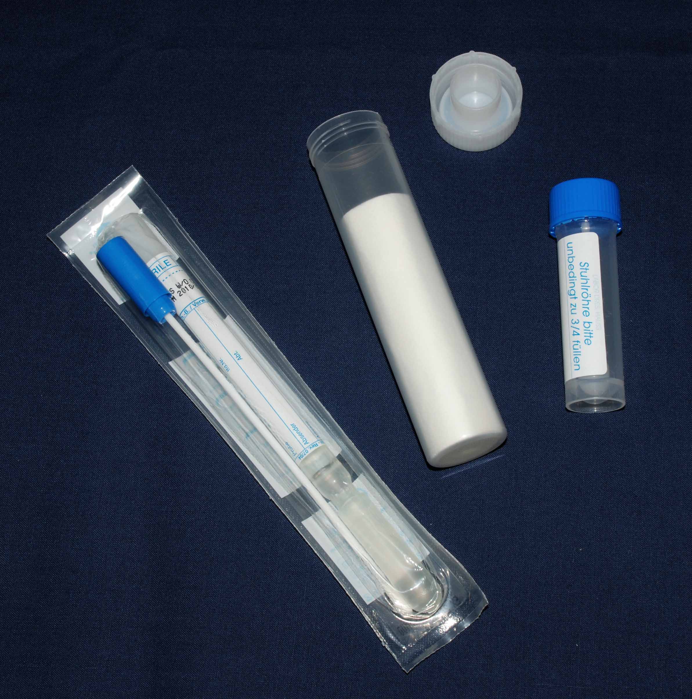 Stool sample jar with security pack and mouth swab (photo Artomedes)